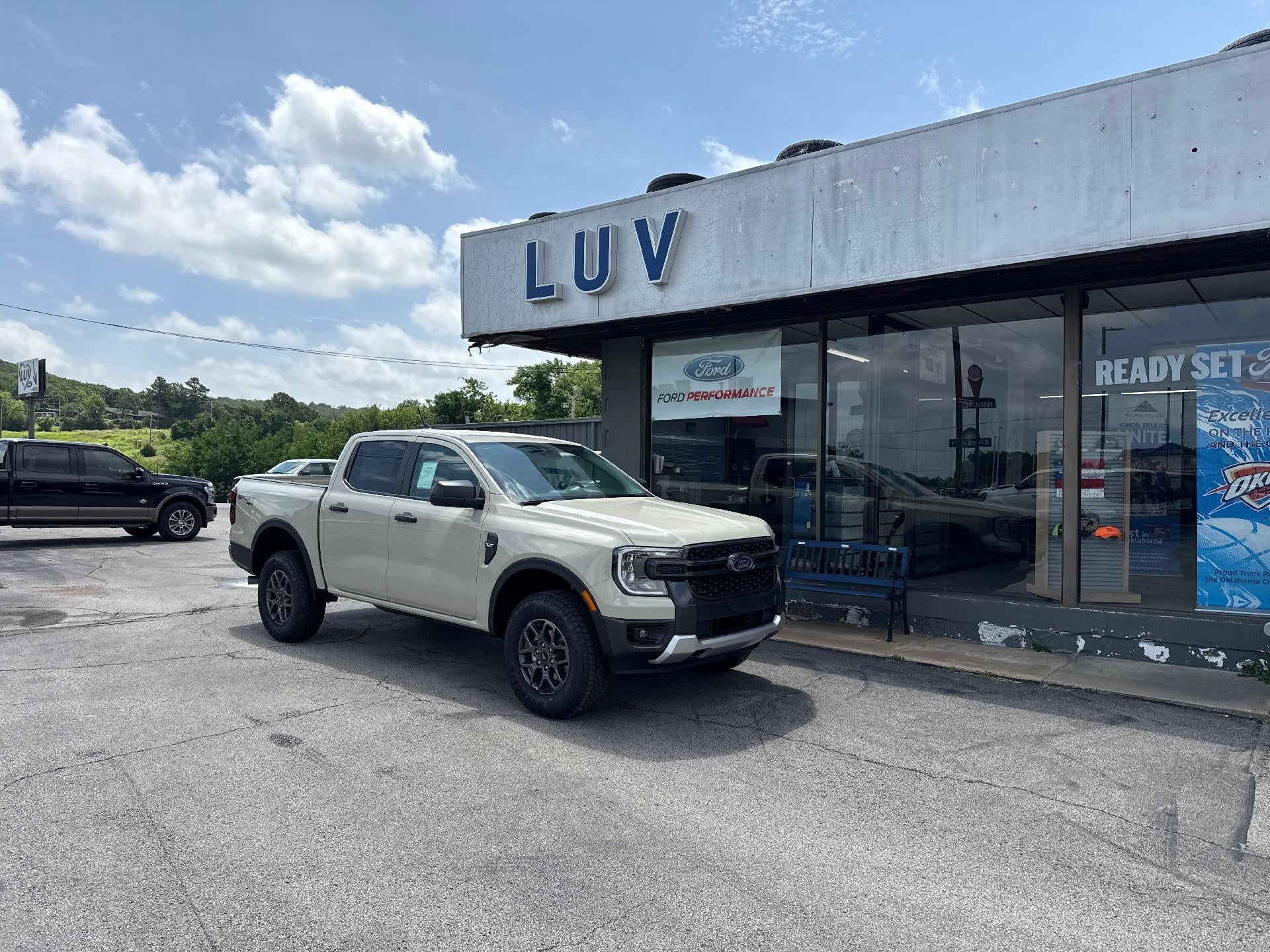 2026 Ford Ranger XLT 4WD SuperCrew 5' Box in Desert Sand — front three-quarter view
