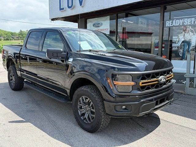 2025 Ford F-150 Tremor 4WD SuperCrew 5.5' Box in Agate Black Metallic — front three-quarter view