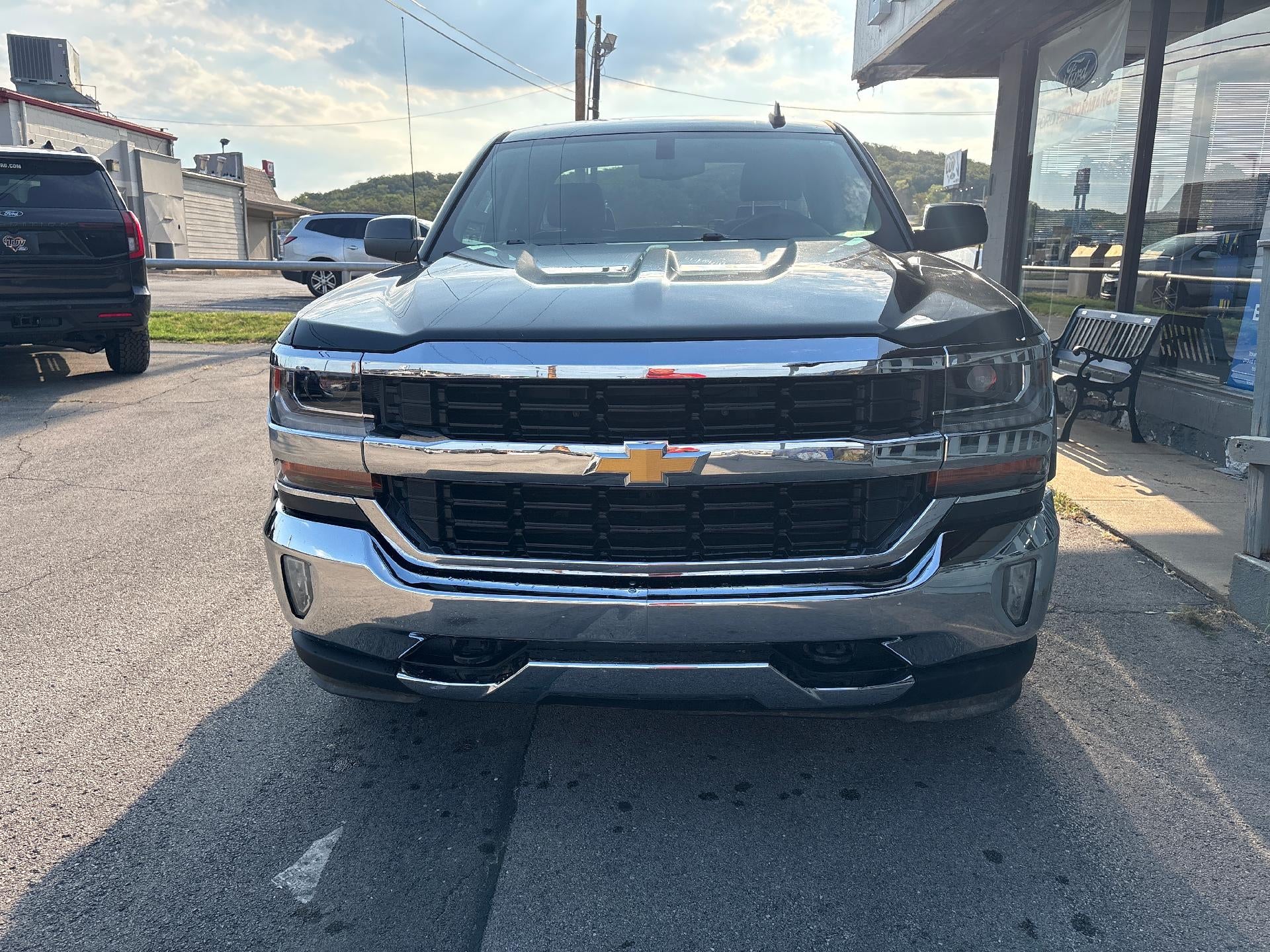 2018 Chevrolet Silverado 1500 Double Cab Standard Box 4-Wheel Drive LT in Graphite Metallic — front three-quarter view