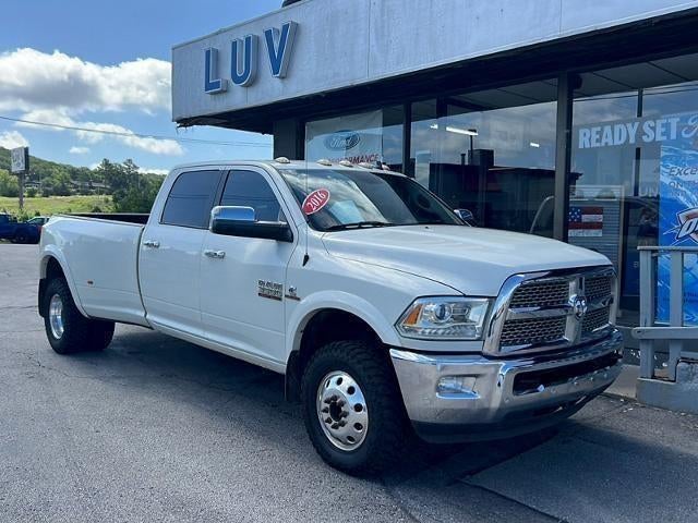 2016 RAM 3500 4WD Crew Cab 8 Ft Box Laramie in White — front three-quarter view
