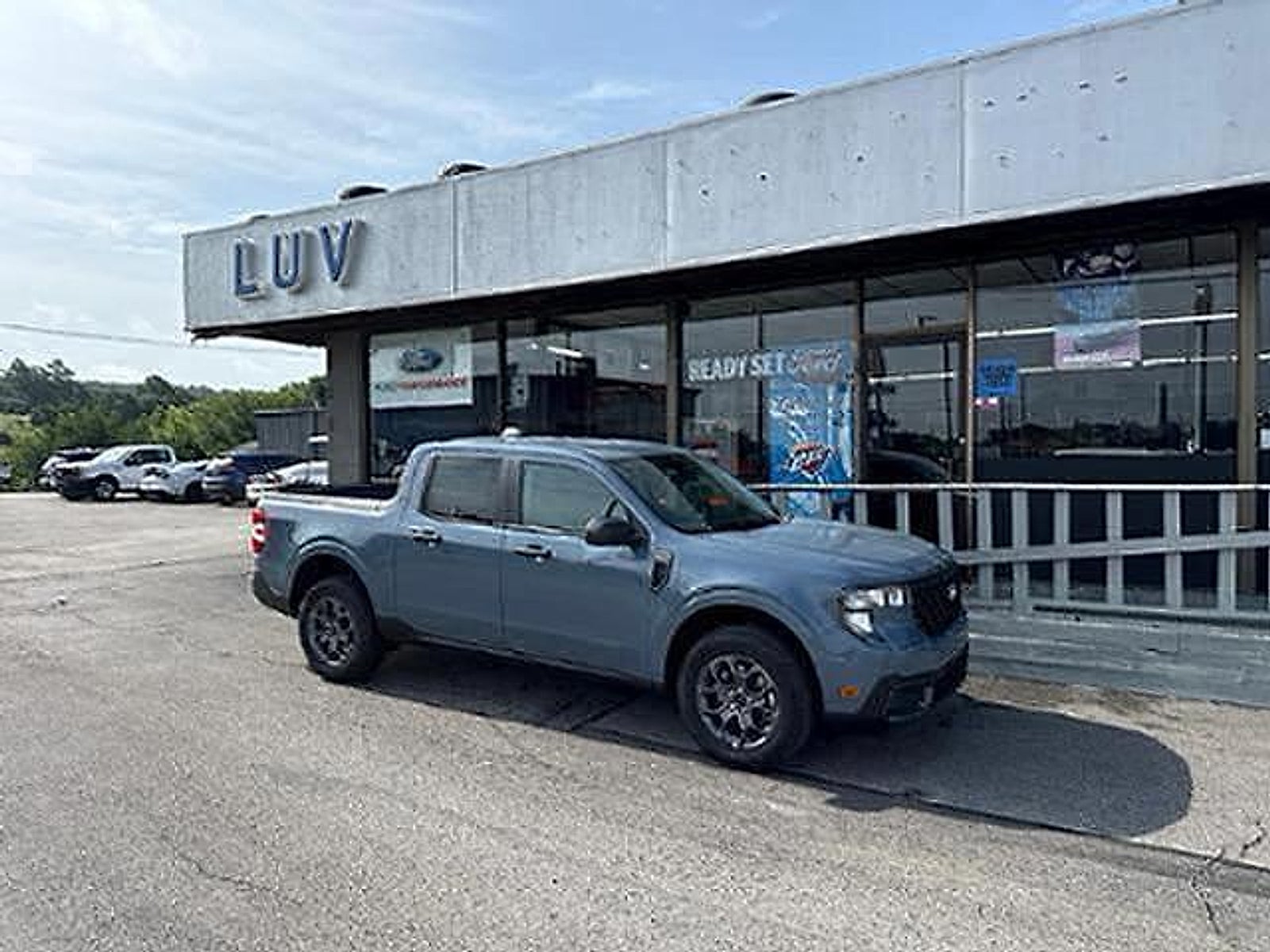 2026 Ford Maverick XLT FWD SuperCrew in Azure Gray Metallic Tri Coat — front three-quarter view