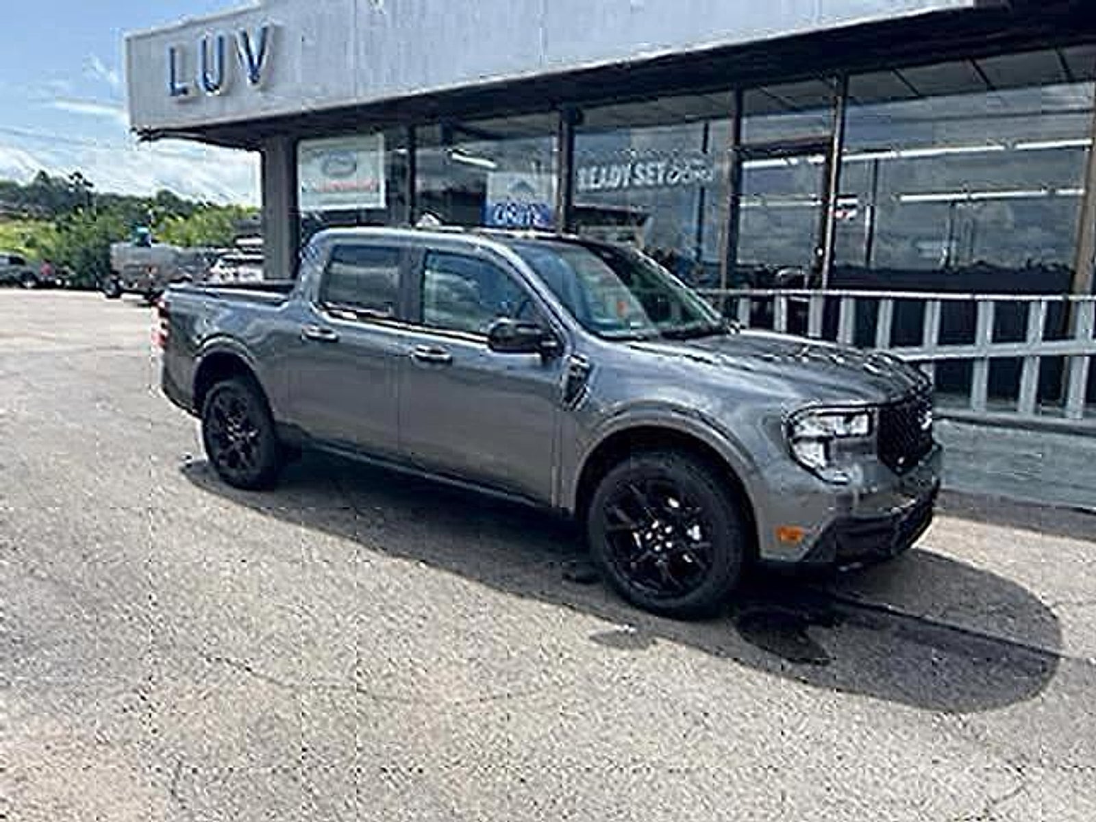 2026 Ford Maverick XLT AWD SuperCrew in Carbonized Gray Metallic — front three-quarter view
