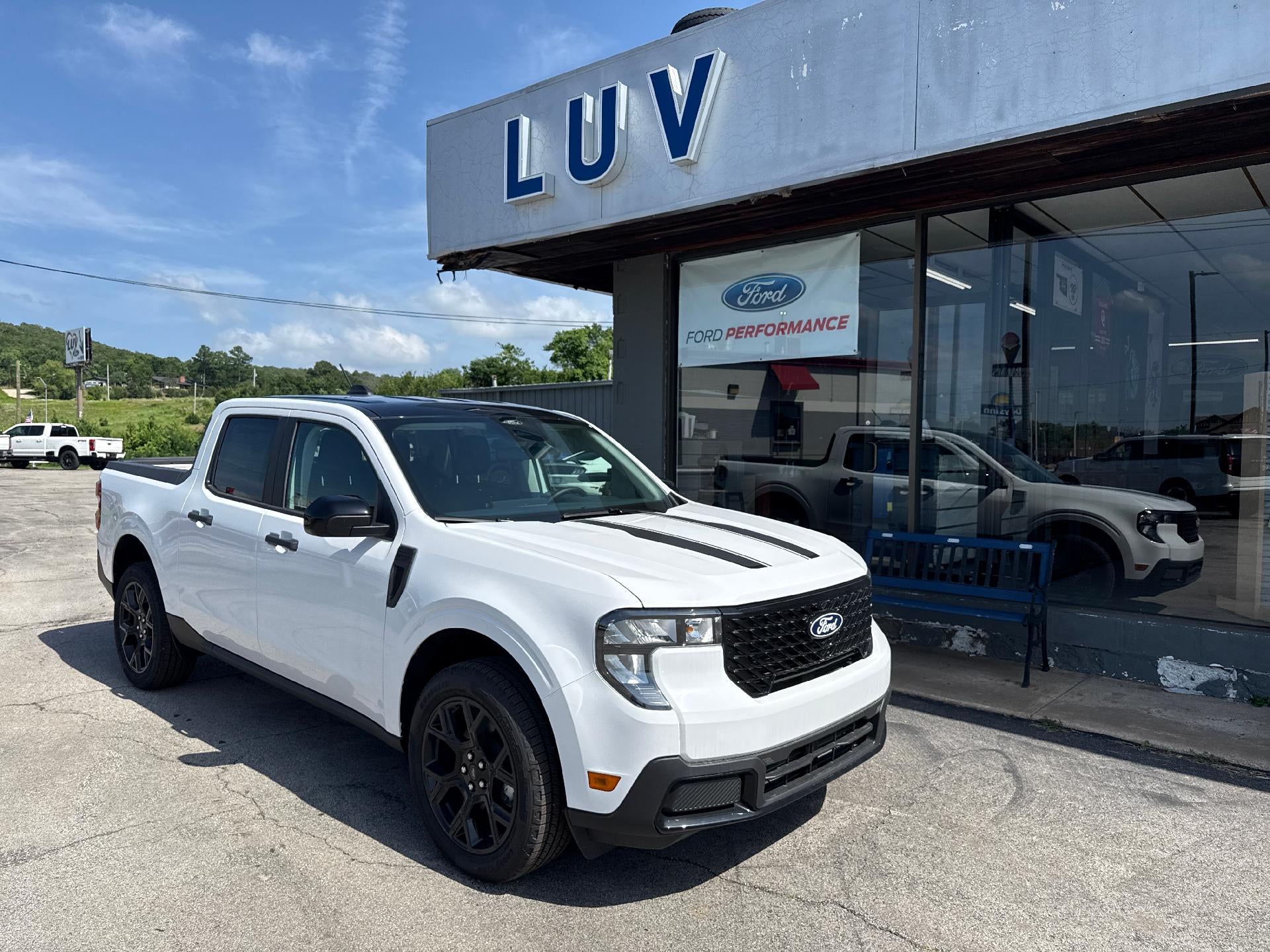 2026 Ford Maverick XLT AWD SuperCrew in Oxford White — front three-quarter view