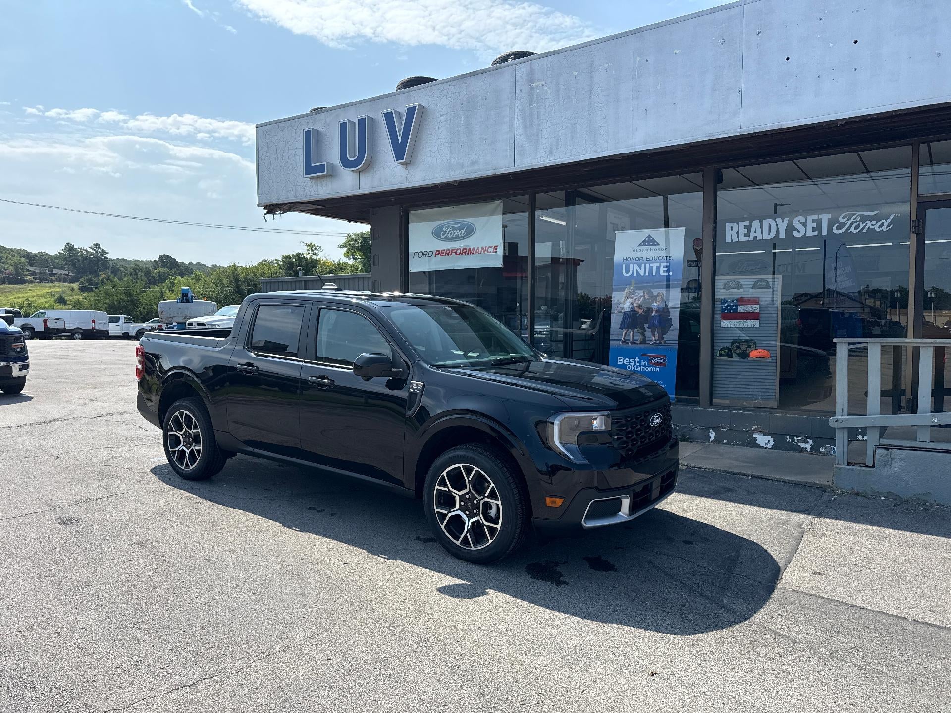2026 Ford Maverick LARIAT AWD SuperCrew in Shadow Black — front three-quarter view